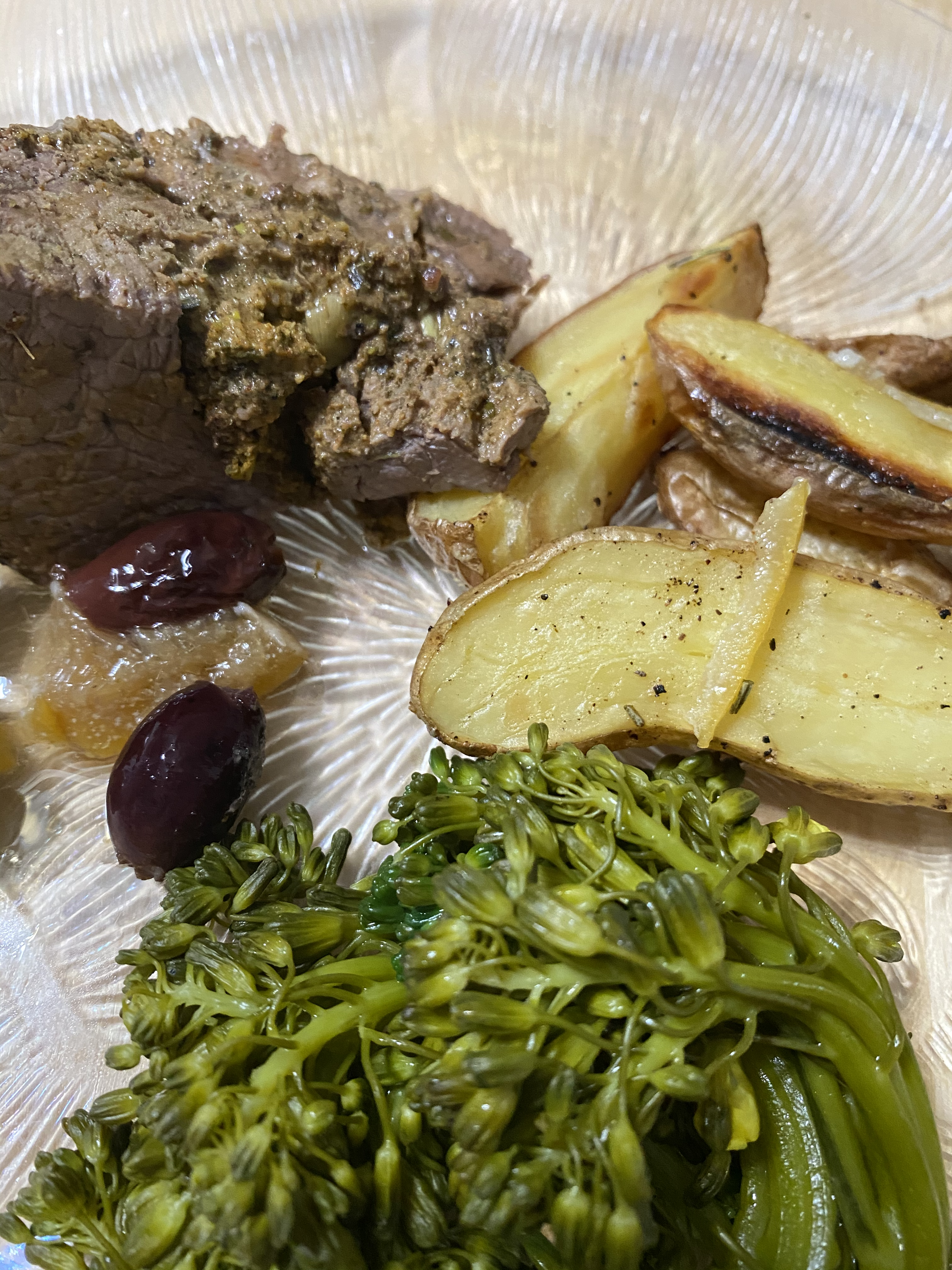 Roast Lamb with Olives and Preserved Lemons served with Roasted Fingerlings with Preserved Lemons and Broccolini